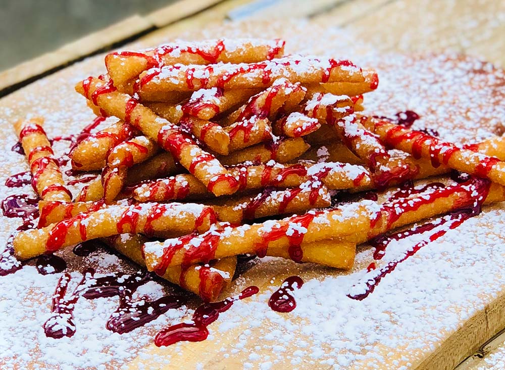 Funnel Fries shown with Chocolate Sauce