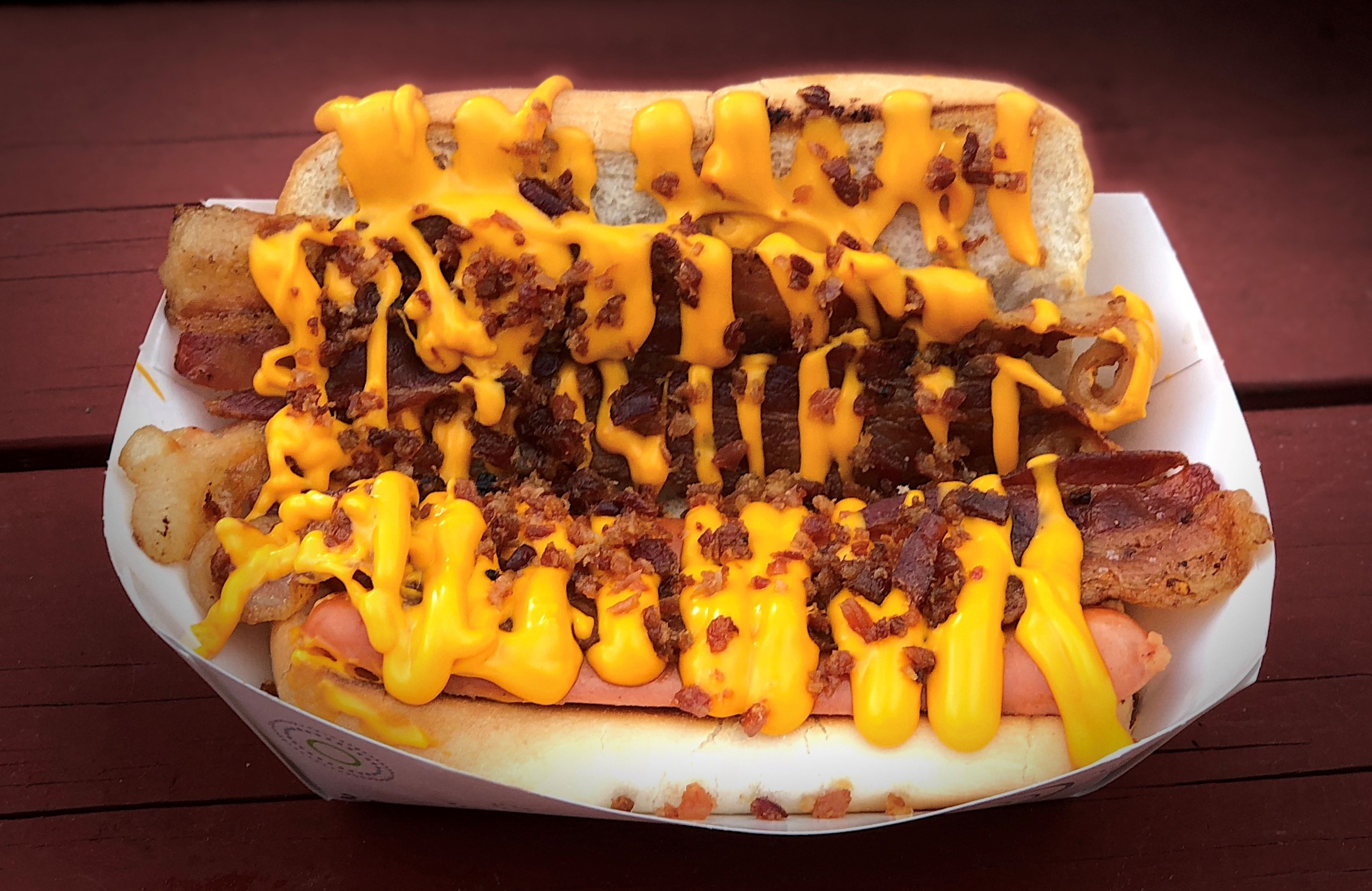 Pictured here:  Hog Dog Wiener featuring Bacon, Bacon, Bacon, Pepperoni, Cheese Sauce.